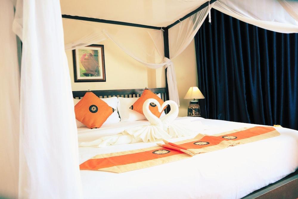 Harmony Patong Hotel - Tap to explore photos