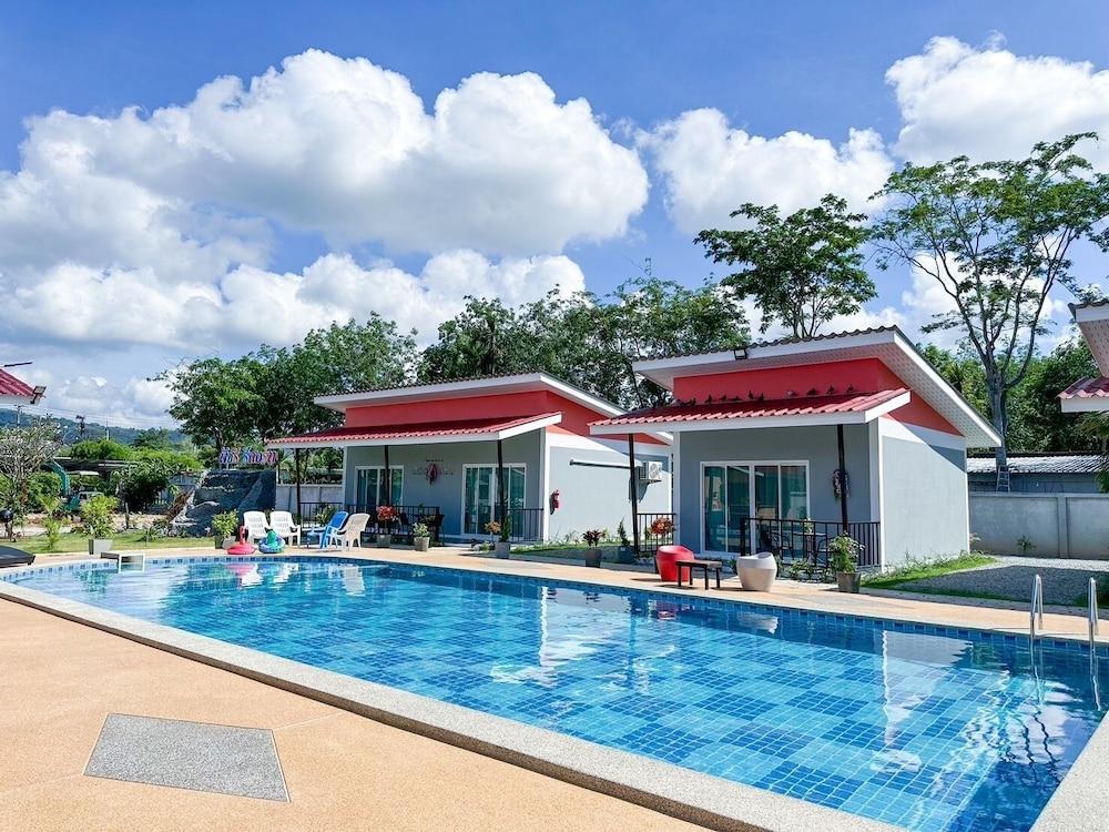 Patcharee Resort - Tap to explore photos