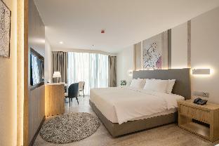 SZ CANALSIDE HOTEL Room Type - Deluxe King Room