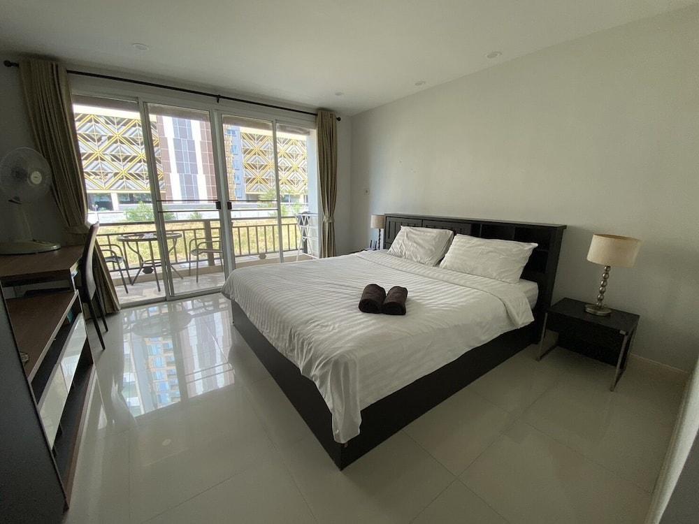 Jomtien Beach Penthouses by PSR - Tap to explore photos