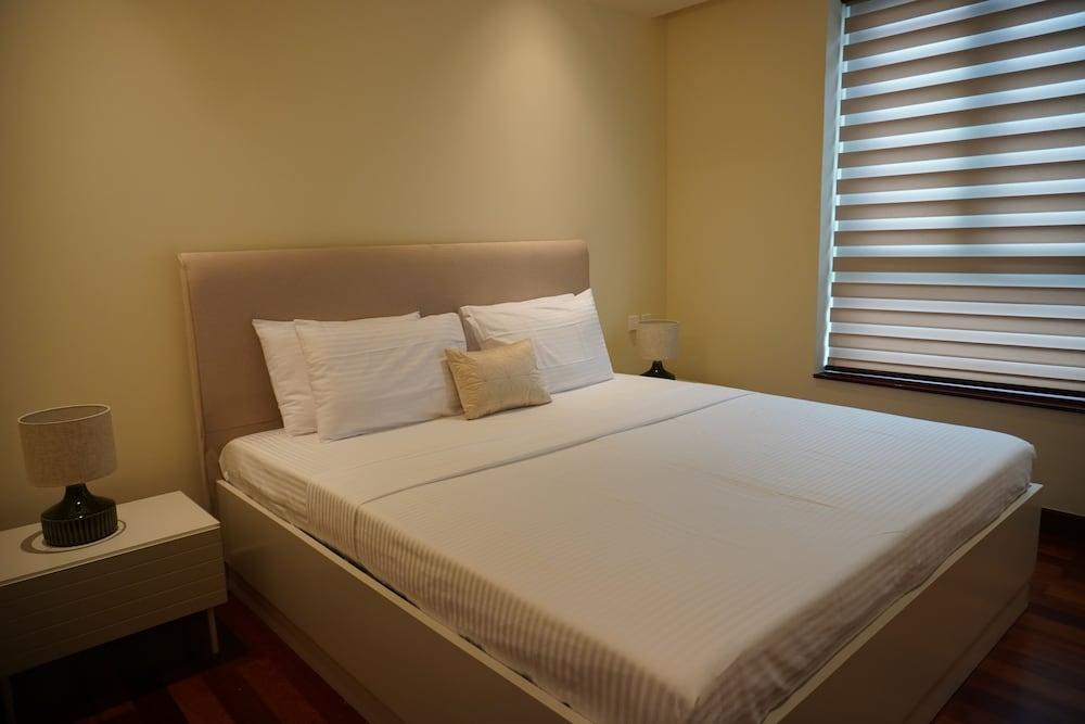 Opulent Comfort Suites - Tap to explore photos