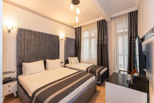 The Now Hotel Room Type - Deluxe Triple Room The Now Hotel Room Type - Deluxe Triple Room