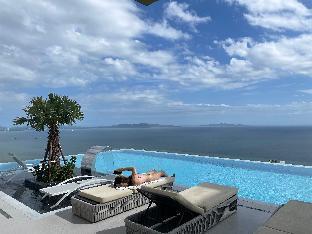 Copacabana Jomtien Beach Condo - Tap to explore photos