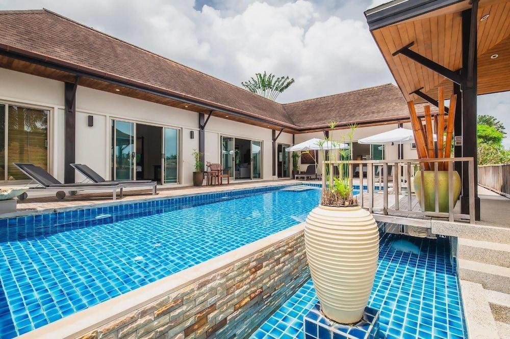 Ivory Pool Villa in Nai Harn - Tap to explore photos