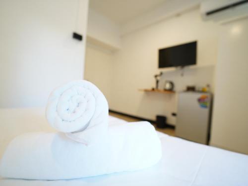 RoomQuest IT Square Don Mueang Airport - Tap to explore photos