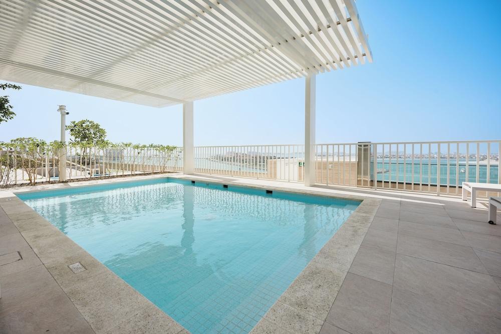Stayis-Emaar Beach front View 1 BR suite - Tap to explore photos