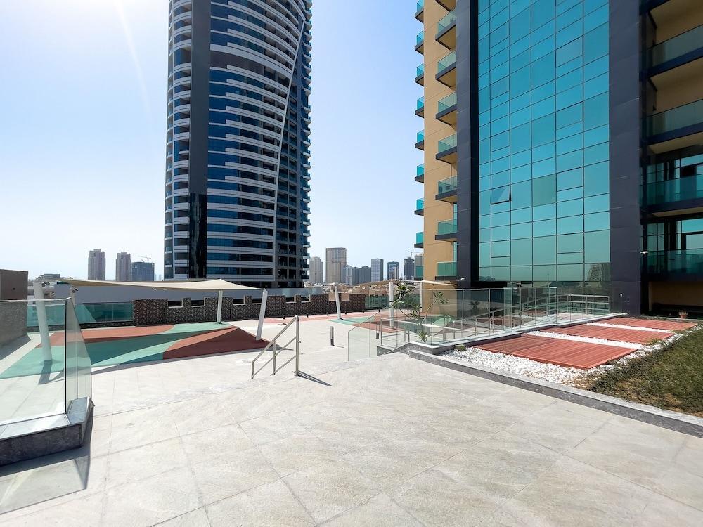Square Tower JVC Studio with City View - Tap to explore photos