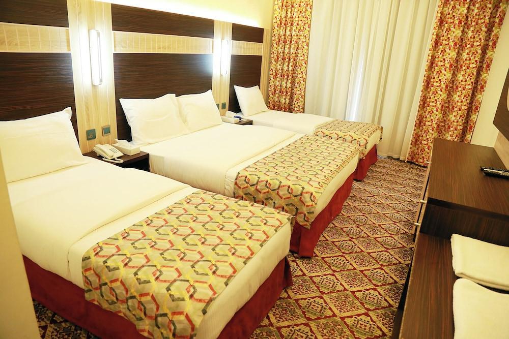 DEEMA HOTEL Room Type - Standard Quadruple Room