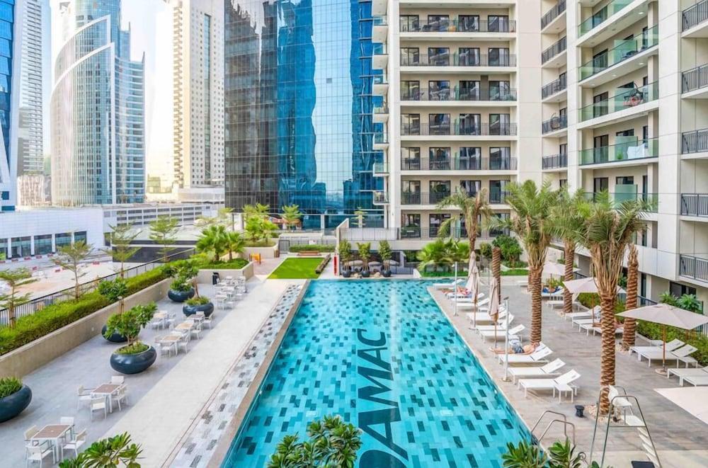 Fascinating 1BR Apt in Zada Tower - Tap to explore photos