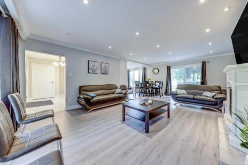 Stunning 7 Br RougeView Home with 2 Kitchens, 5 Bathrooms, Amazing Backyard & 8-Car Parking - Tap to explore photos