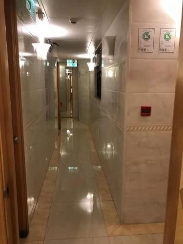 New First Guesthouse 新第一宾馆 - Tap to explore photos