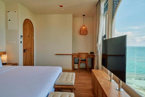 Stone Hotels Dhiffushi Room Type - Deluxe Seaview Room Stone Hotels Dhiffushi Room Type - Deluxe Seaview Room