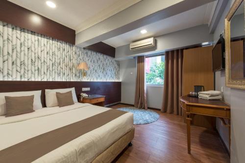 Grand Orchard Hotel Premier - Tap to explore photos