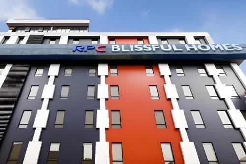 RPC Blissful Homes & Hotel - Tap to explore photos