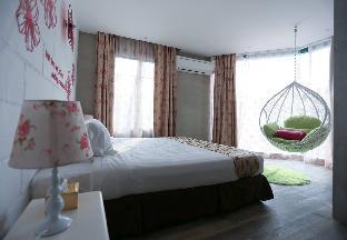 Just In Boutique Hotel - Tap to explore photos