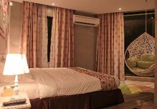 Just In Boutique Hotel - Tap to explore photos