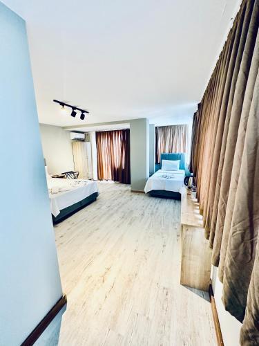 The Hera Gold Hotel Room Type - Triple Room with City View The Hera Gold Hotel Room Type - Triple Room with City View