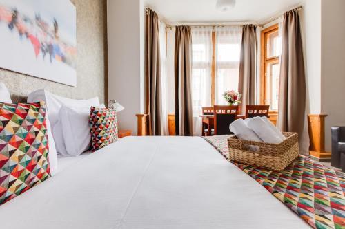 Kafka Prague rooms - Tap to explore photos