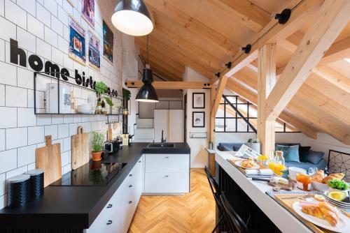 Design Loft with AC near Zizkov Tower by Prague Days - Tap to explore photos