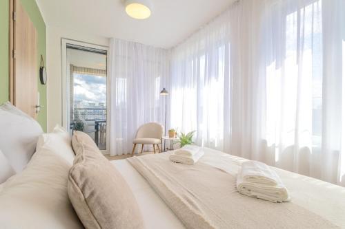 Bright 2BR - 7th floor, Balcony, Free Parking by Gravity Prague - Tap to explore photos