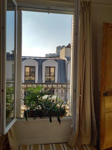 Appartement avec balcon au cœur PARIS