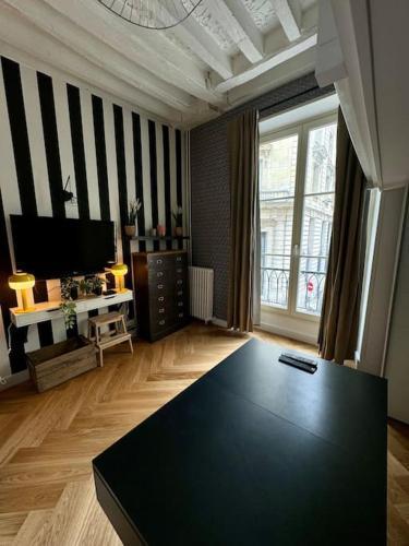 Appartement au cœur de Paris - Tap to explore photos
