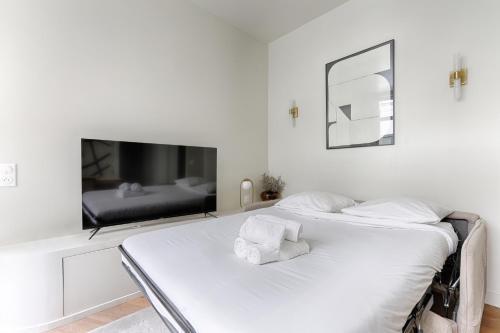 Appartement de charme 1BR Condorcet Saint-Georges - Tap to explore photos