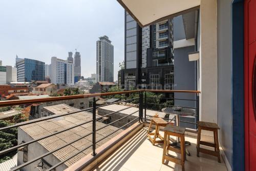 Ian Hotel Jaksa Mitra RedDoorz - Tap to explore photos