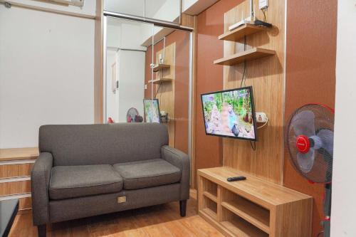 Combined and Spacious 3BR at Green Pramuka City Apartment By Travelio - Tap to explore photos