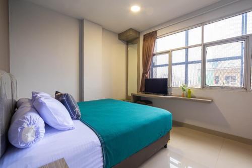 Kelowna Mangga Besar by AbdiHome