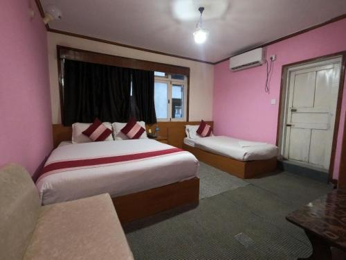 Kusum Hotel - Tap to explore photos