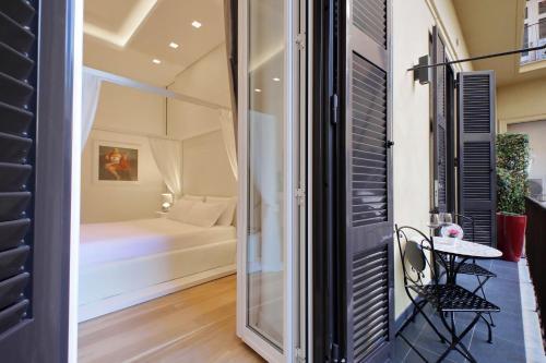 Domus Aurea Luxury Suites - Tap to explore photos