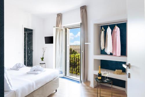 Elysium Suites Colosseo Room Type - Deluxe Room with Colosseum View Elysium Suites Colosseo Room Type - Deluxe Room with Colosseum View