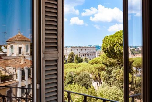 Elysium Suites Colosseo - Tap to explore photos