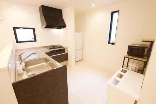 FINOA Residential Suite Kameari - Tap to explore photos