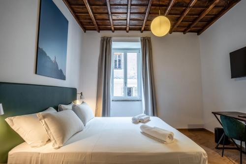 Fantini Rooms-Monti - Tap to explore photos