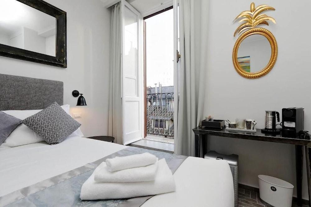 Boutique Suites della Croce - Tap to explore photos