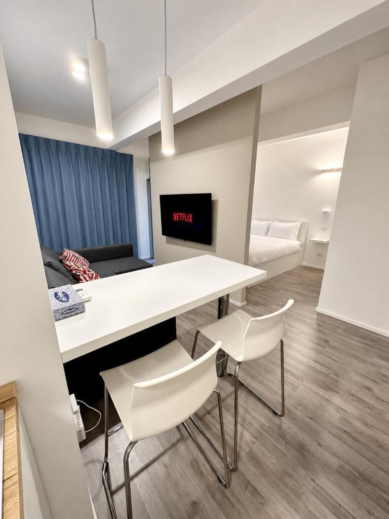Cozy design studio apartment in Porta Maggiore. - Tap to explore photos