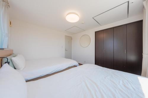 FUJIMI TOWN HOUSE - Tap to explore photos
