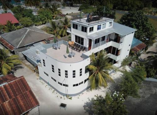 Hanifaru Beach Inn - Tap to explore photos