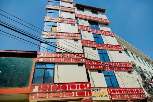 Hotel Everest Regency - Tap to explore photos