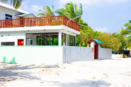Feridhoo Beach Villa - Tap to explore photos