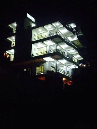 Hello Inn Guest House & Apartment - Tap to explore photos
