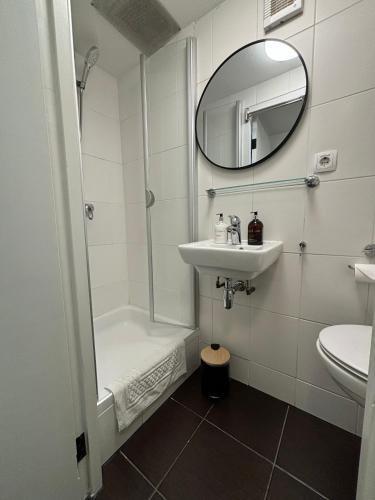 Central Guest Rooms - Tap to explore photos