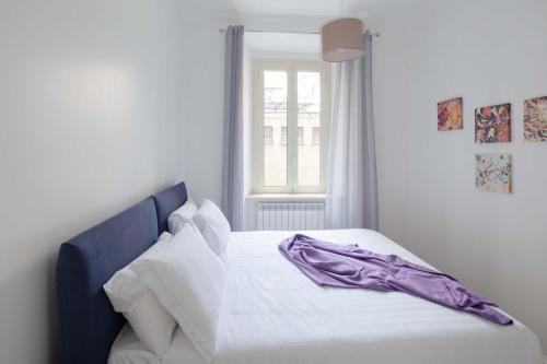 Vespasiano 56 Holiday Apartment - Tap to explore photos