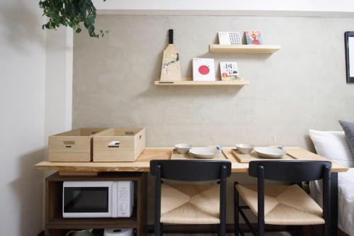 Kaku Studio Apartment Ikebukuro - Tap to explore photos