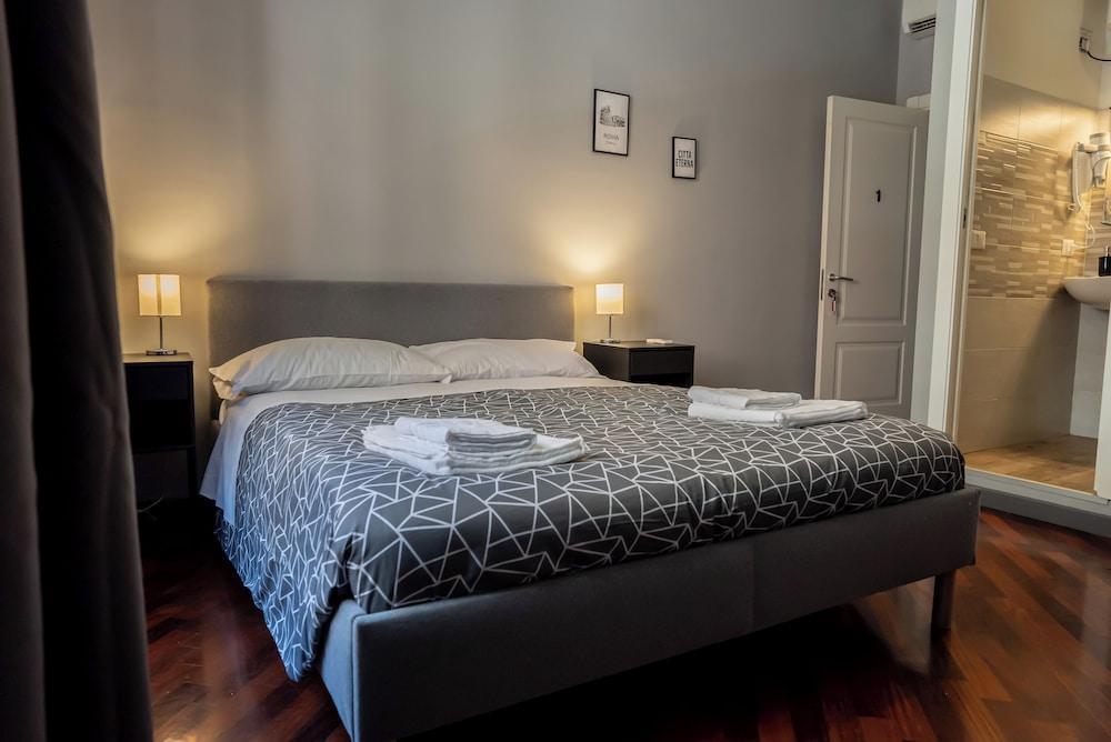 Trastevere Guestrooms - Tap to explore photos