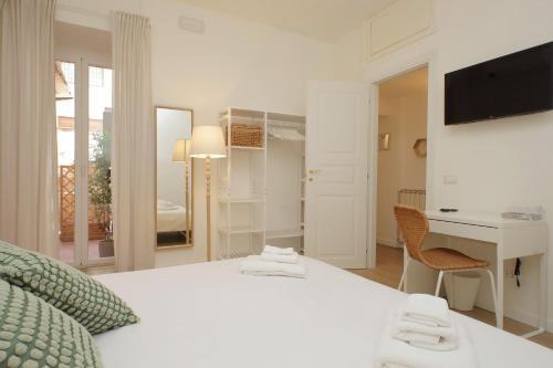 Porta Flaminia Suites - Tap to explore photos