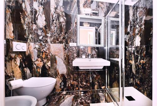 Vatican Suites in Cola Di Rienzo - Tap to explore photos