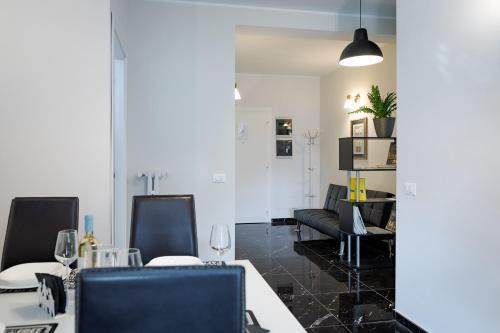 Style134 Apartment 50 meters from Metro A Lucio Sestio Station - Tap to explore photos